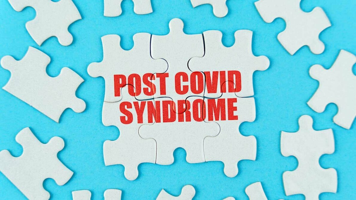 Post_COVID_AdobeStock_550105846_edited.jpg Puzzleteile mit Aufdruck Post COVID Syndrome